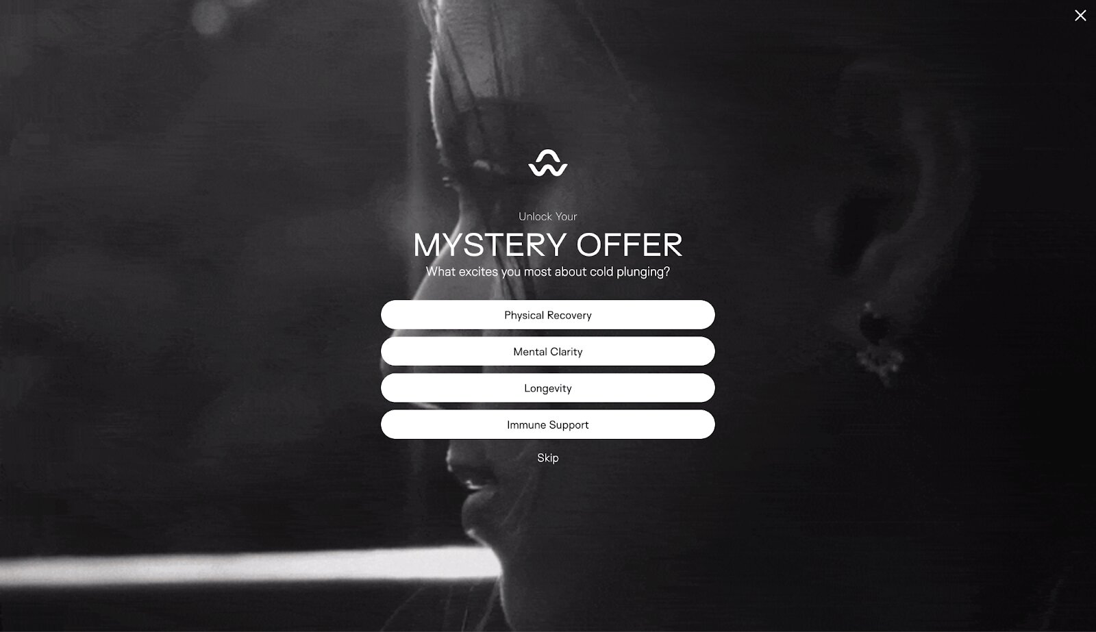 Ecommerce customer acquisition: A grayscale image shows a close-up of a person’s face in profile. Text overlay offers a “Mystery Offer” about cold plunging, with options: Physical Recovery, Mental Clarity, Longevity, Immune Support, and a Skip button below.