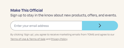 Embedded form email signup example in the footer at TOMS